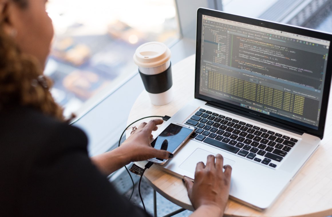 A woman working on a laptop