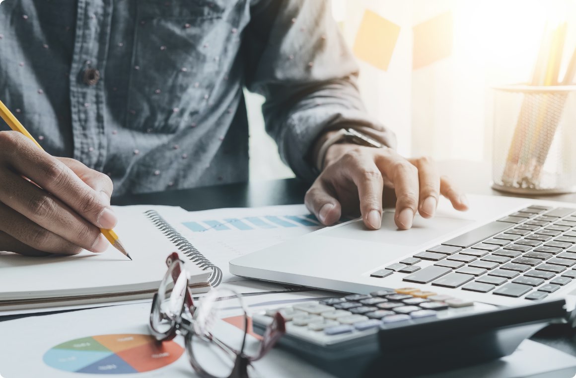 A close up of a person working at desk