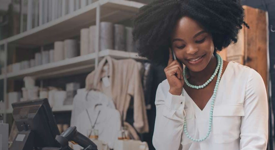 A woman on the phone working