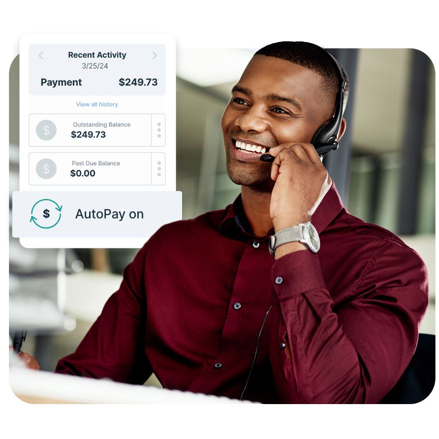 A man smiling and setting up AutoPay over the phone.