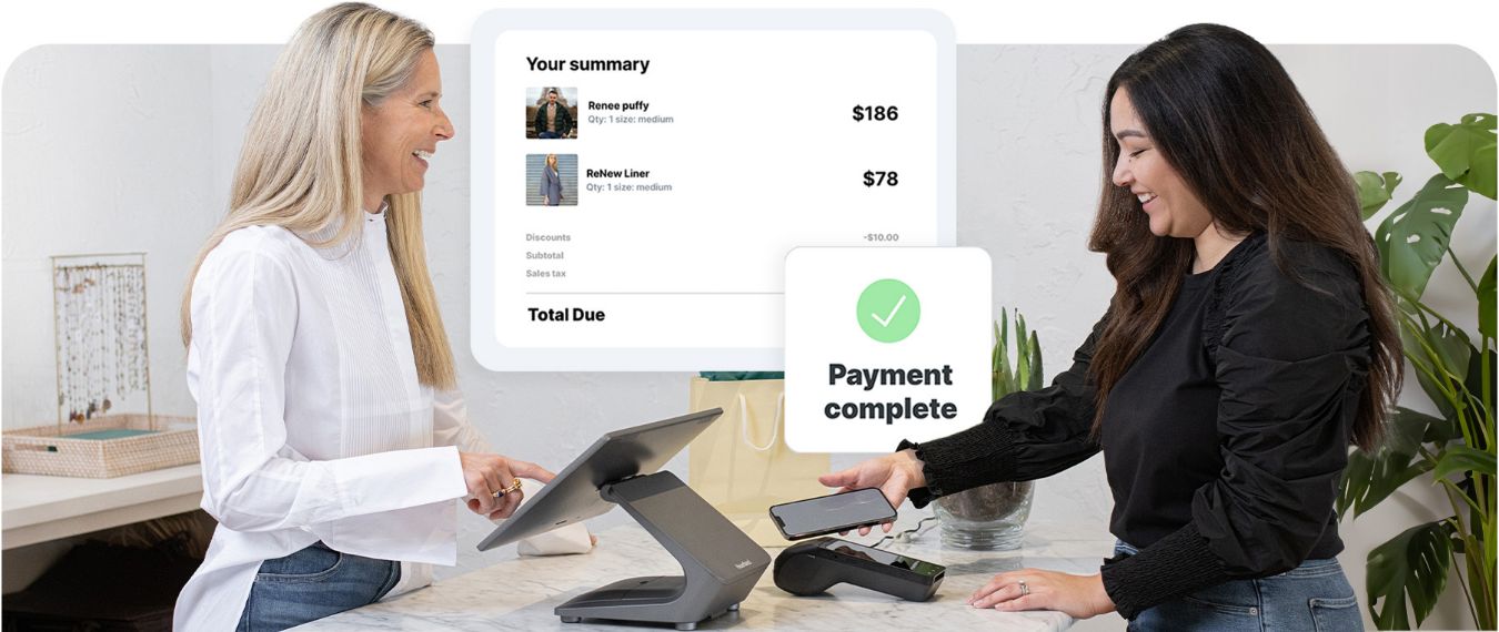 Business owner and customer completing a transaction with customer tapping for payment on a card reader.