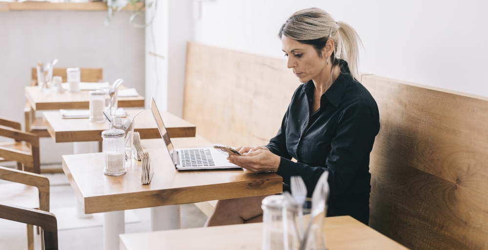 Woman working on phone