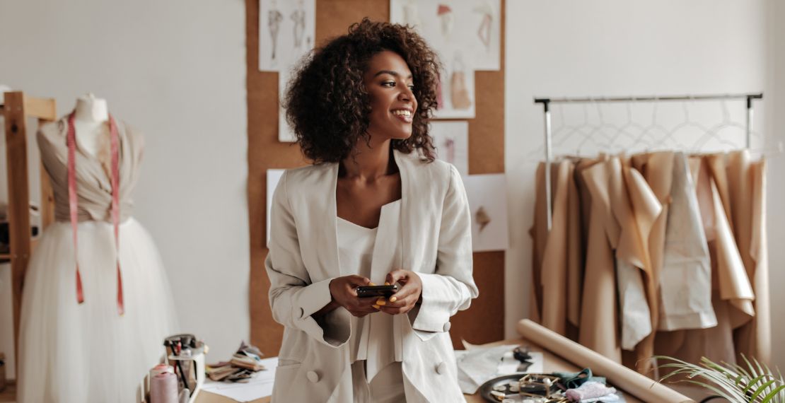 A woman smiling in a retail store