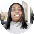 The face of a female, small-business owner.
