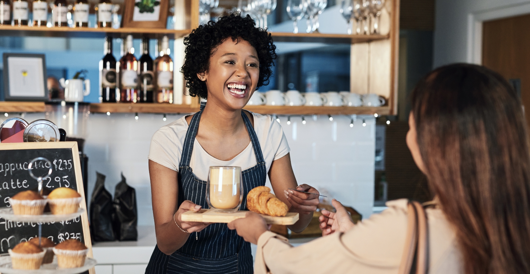 Business owner hand customer their delicious purchase