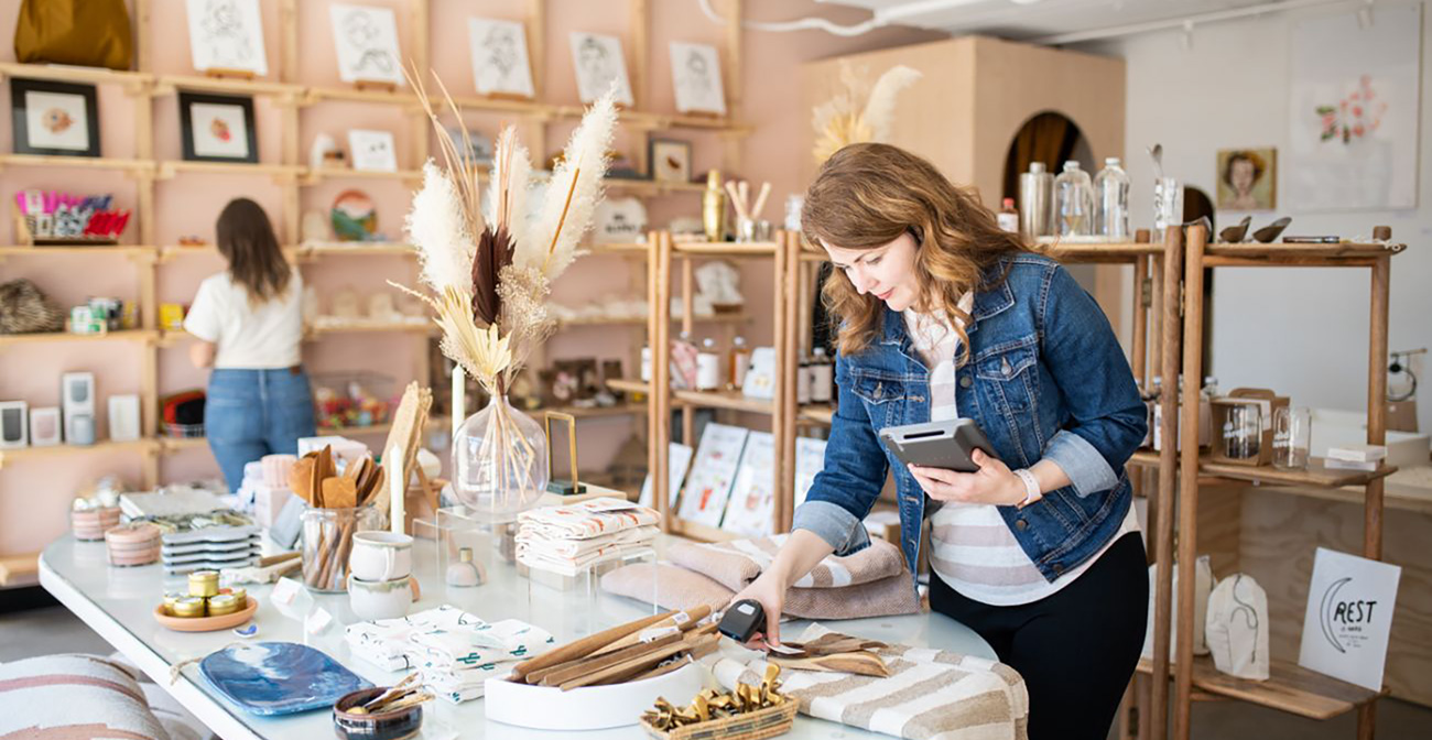 Two employees working in a retail store.