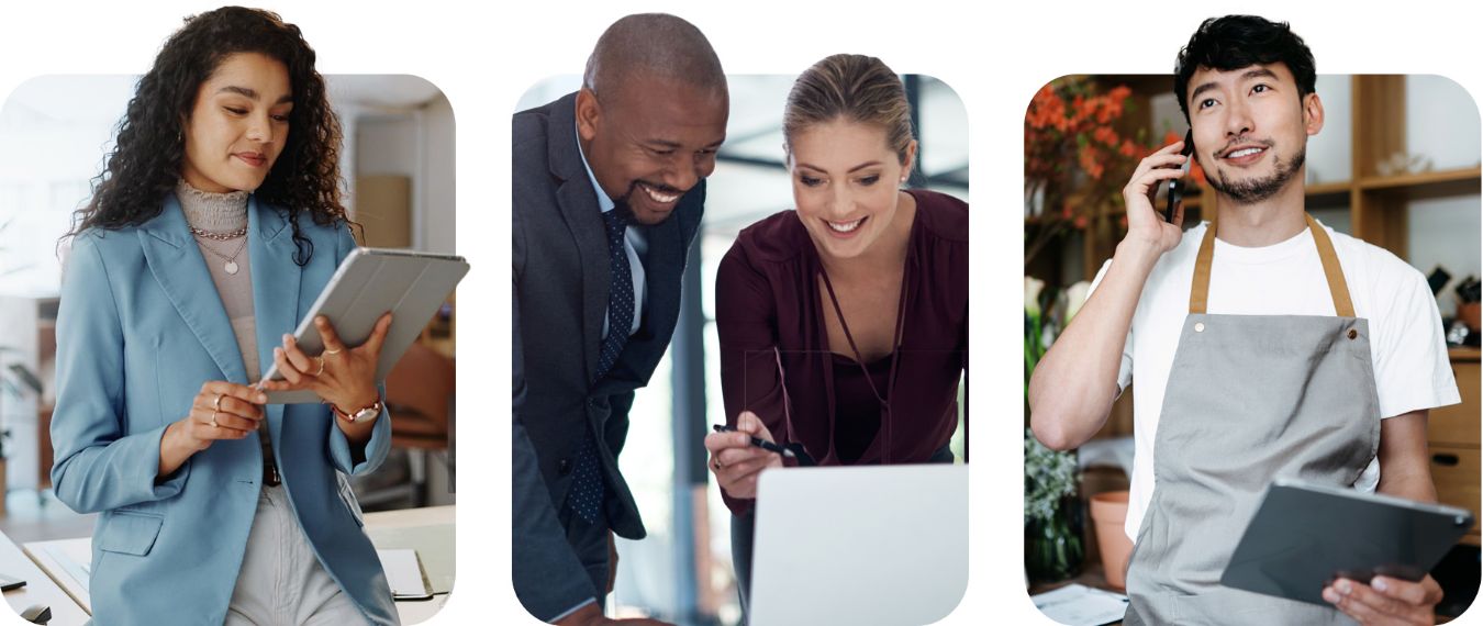 Business owners use a phone, tablet and two people collaborating using a laptop